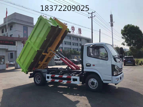 國(guó)六東風(fēng)多利卡勾臂式垃圾車批量下線銷售_新中綠專汽